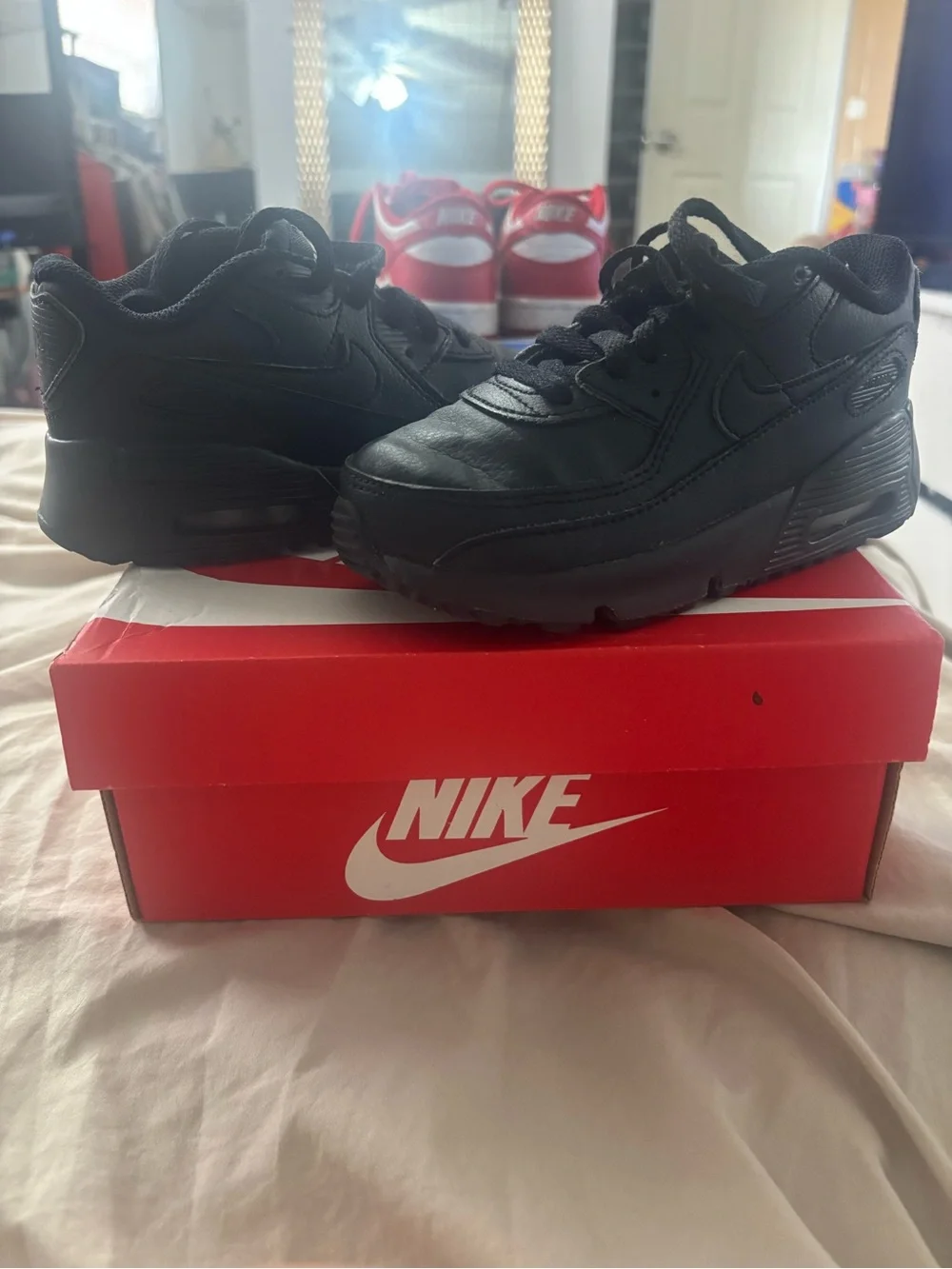 Nike Kids All-Black Athletic Sneakers